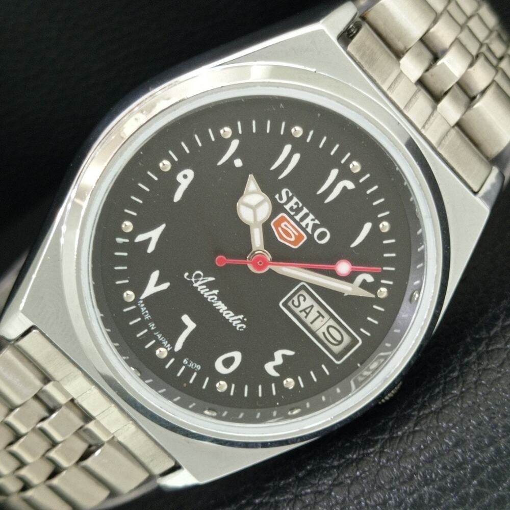 Vintage 1976 Seiko Automatic Mens Silver Watch W/daydate & Black accents
